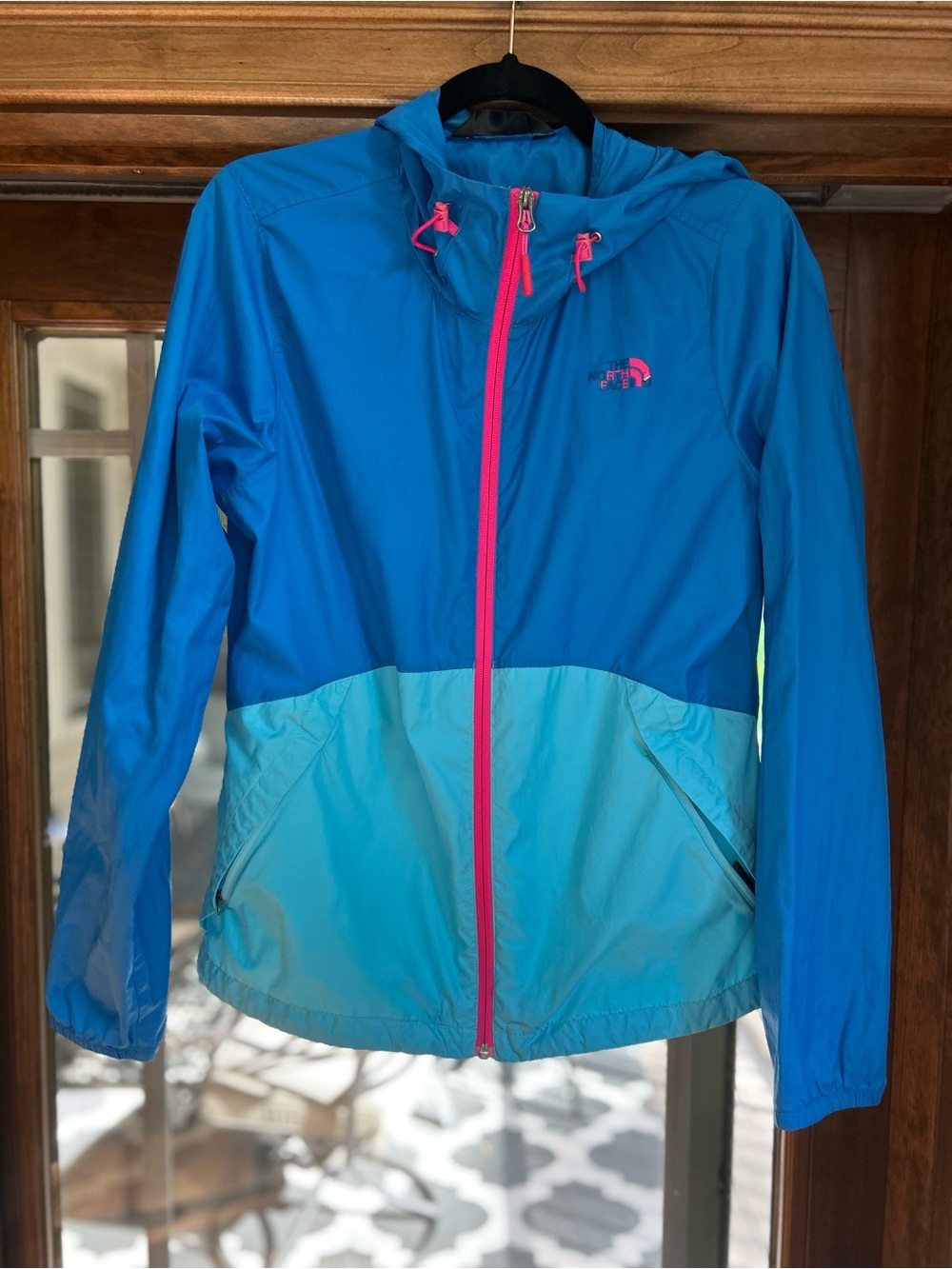 The North Face Blue Two-Tone Hooded Windbreaker with Pink Zipper